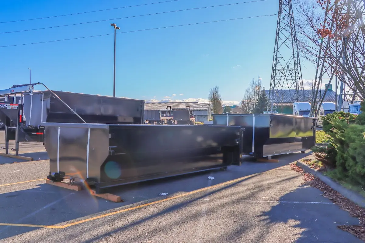 Roll-off dumpster ready for waste disposal at job site for 2 Yard Dumpster Rental in Burleson